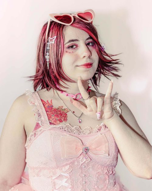 Lookbook Photoshoot Rompe lo Dulce Soft Backdrop Cute Dark Pink Choker Earrings Candy Portrait