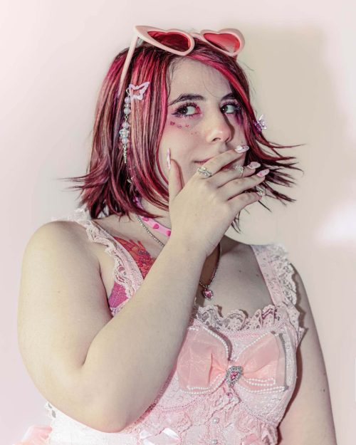 Lookbook Photoshoot Rompe lo Dulce Soft Backdrop Cute Dark Pink Choker Earrings Candy Portrait